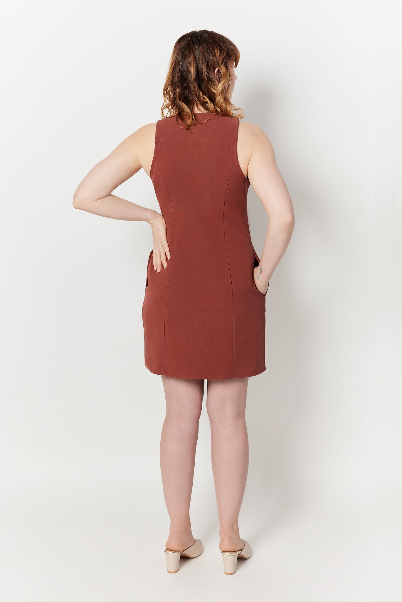 The Everywhere Dress is expertly constructed to slim through the waist with a roomy fit for pear and hourglass shapes There is no awkward bunching or pulling at the waist and hips. Shown here is the back view of The Everywhere Dress in Rosewood.