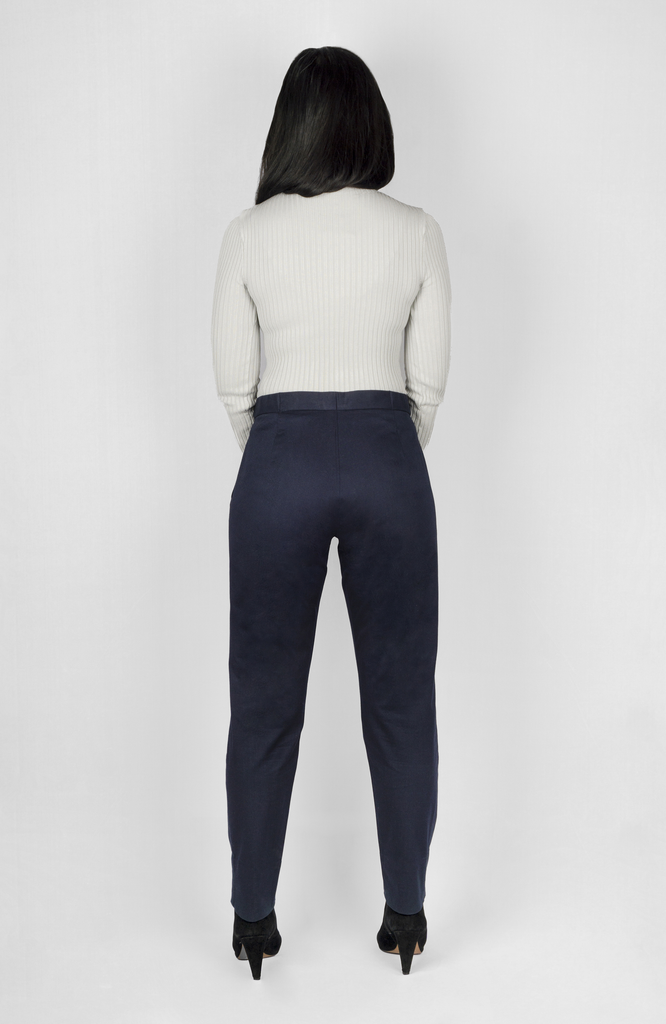This is the back view of The Flex Waist Pant by Aam The Label where you can see the fit at the waist, hip and thigh. It’s shown here in a navy blue.