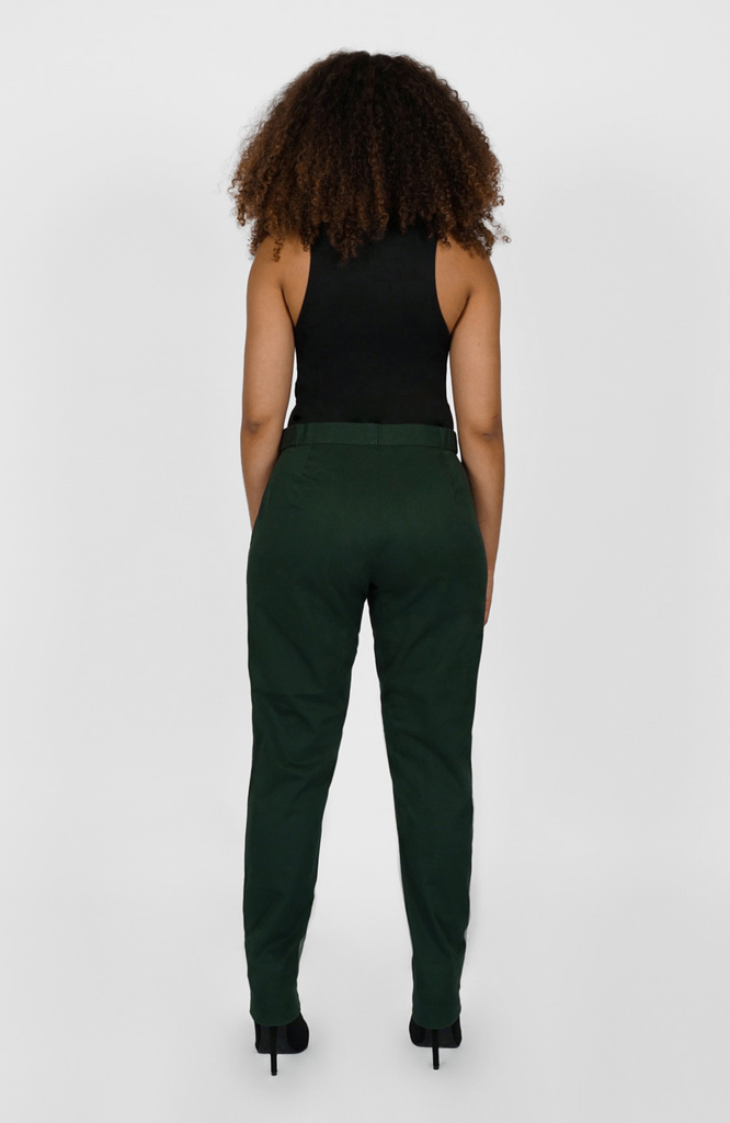 This is the back view of The Flex Waist Pant by Aam The Label where you can see the fit at the waist, hip and thigh. It’s shown here in a classic forest green shade.