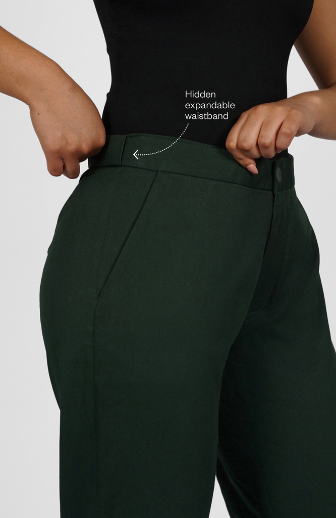 As seen on Forbes, the Flex Waist Pant by Aam The Label features a hidden expandable waistband that provides 2-3" of stretch without any frumpy elastic. Shown here in a classic forest green shade.