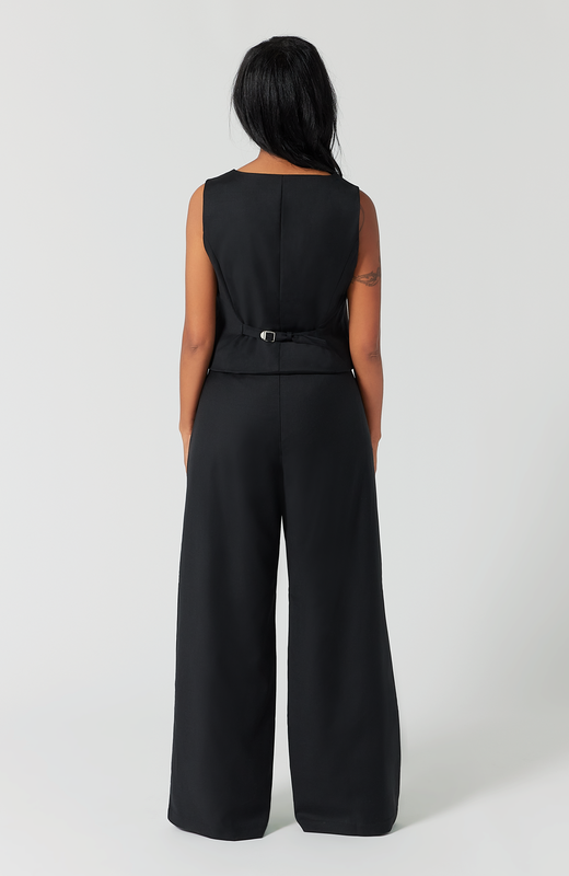 In this back view of the pant and vest, you can see how the pant fits at the waist, hips and thighs, not pulling or creating awkward wrinkles. It is shown here in classic black.