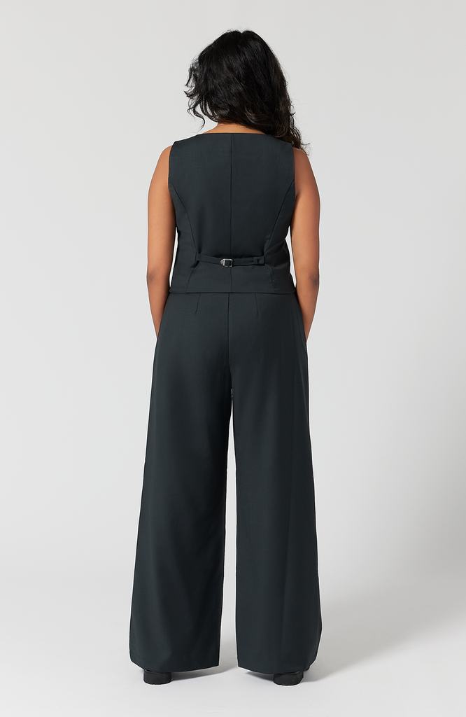 In this back view of the pant and vest, you can see how the pant fits at the waist, hips and thighs, not pulling or creating awkward wrinkles. It is shown here in classic charcoal.