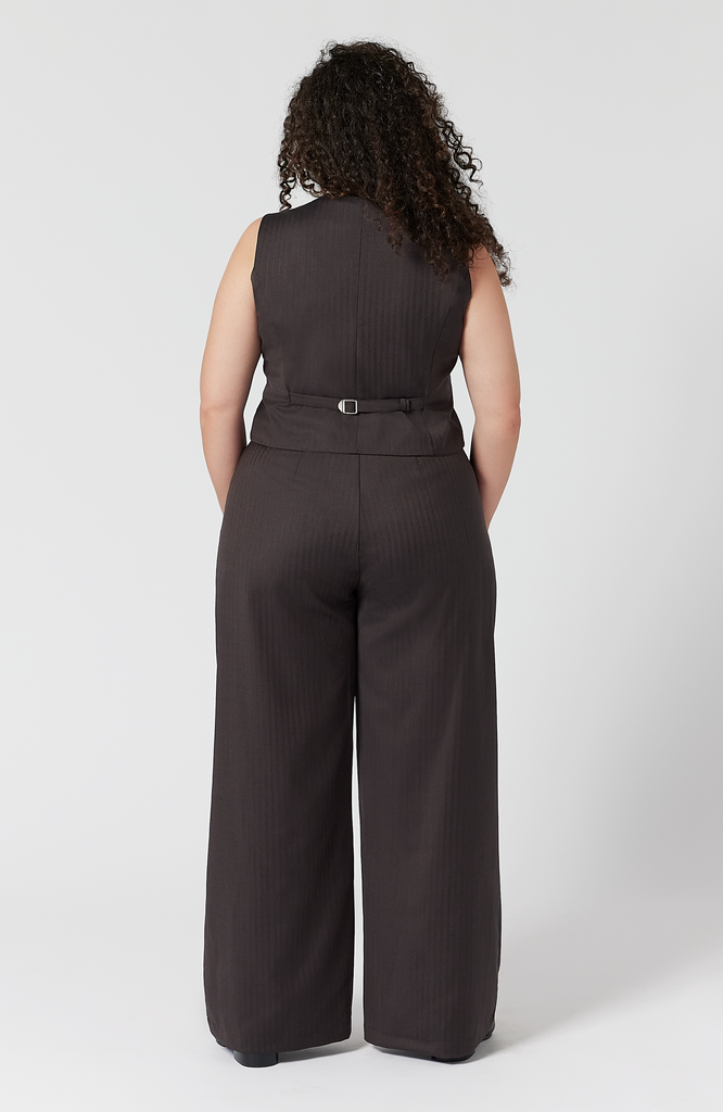 In this back view of the pant and vest, you can see how the pant fits at the waist, hips and thighs, not pulling or creating awkward wrinkles. It is shown here in a gorgeous, deep green shade.