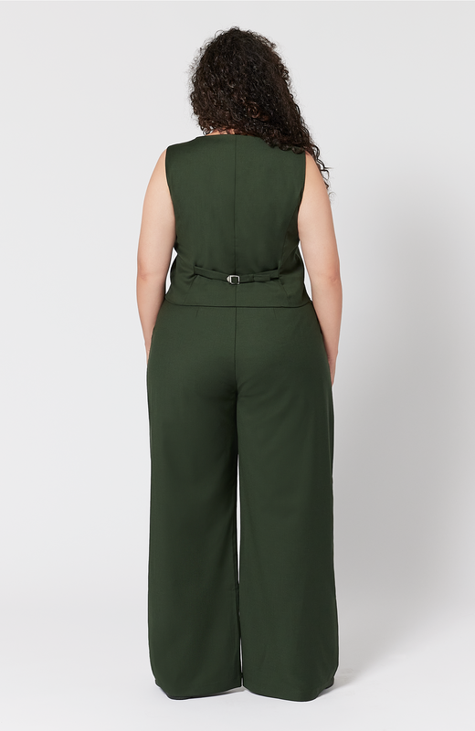 In this back view of the pant and vest, you can see how the pant fits at the waist, hips and thighs, not pulling or creating awkward wrinkles. It is shown here in a gorgeous, deep green shade.