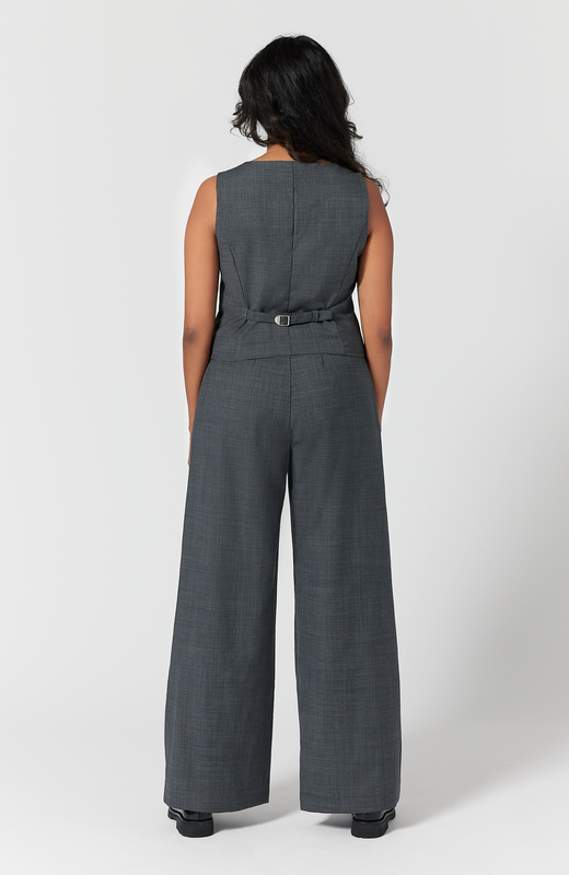 In this back view of the pant and vest, you can see how the pant fits at the waist, hips and thighs, not pulling or creating awkward wrinkles. It is shown here in classic grey.