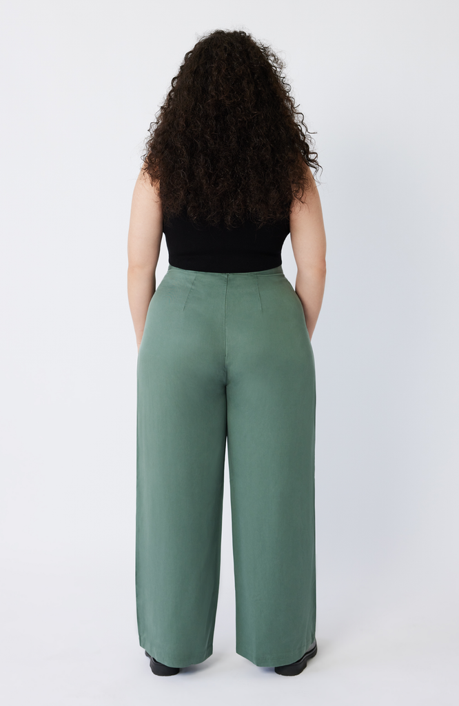 The Wide Leg Pant has an ideal fit at the waist, hips and thighs. There is no strange bunching or wrinkling, no waist gaps, and a clean, elegant fit. Shown here in dreamy, seafoam green.