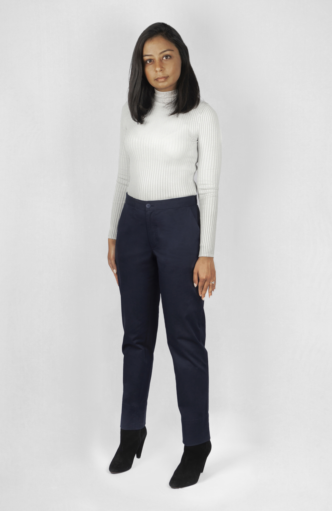 The Flex Waist Pant by Aam The Label is a chic, cotton trouser with a hidden expandable waistband that provides 2-3" of stretch at the waist and a comfortable fit - even on your off days. It is made from a breathable, 98% organic cotton with 2% stretch and is fully machine washable. The pant also has a 4" hem which makes it easy to lengthen or cuff, as needed. The Flex Waist Pant comes in two colors - navy blue (pictured here) and forest green.