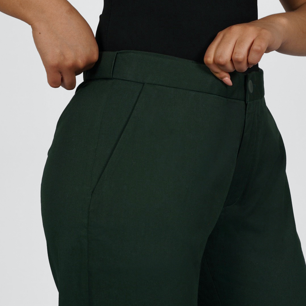 The hidden expandable waistband featured in The Flex Waist Pant by Aam is an innovative feature that provides 3-4" of stretch at the waist while remaining work-appropriate. It gives the trouser a chic, elegant and comfortable finish.