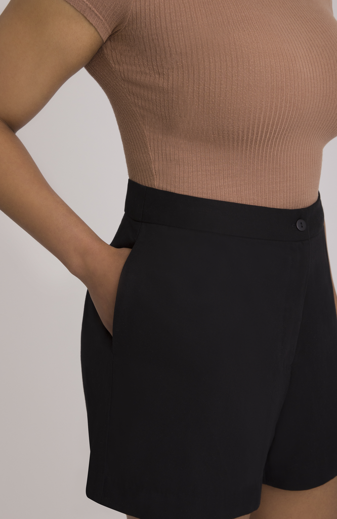 The Anywhere Short features deep, functional pockets that comfortably fit your whole hand, most smartphones or a small wallet. Shown here in classic black.