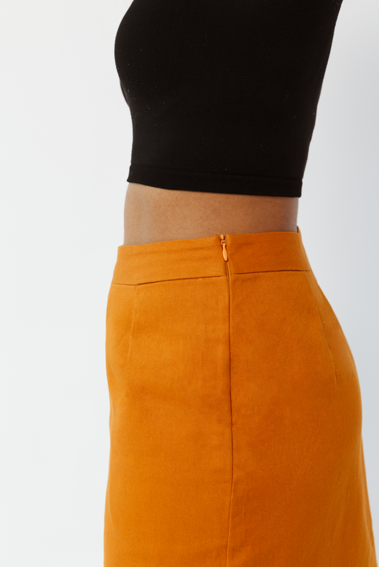 The Mini Skirt by Aam has a hidden side zipper closure for ease of wear.