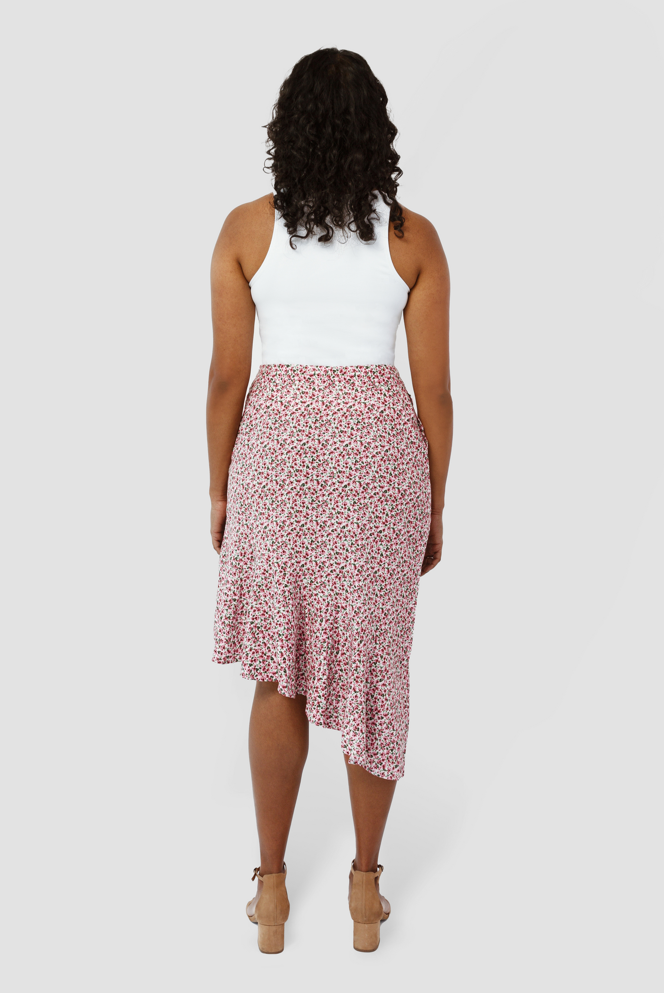 The Cascade Skirt by Aam is designed to sit snug at the waist with more room for full hips and thighs. In this image you can see the back view.
