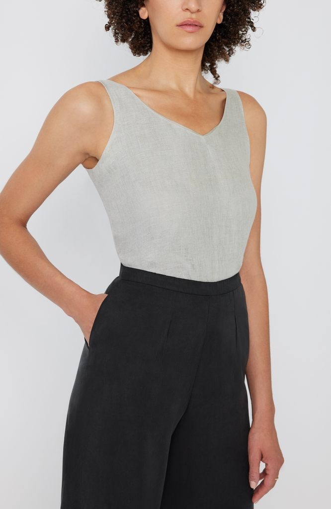 The Tall Wide Leg Pant features deep, inseam pockets that comfortably fit your whole hand, a smartphone or a small wallet. It’s shown here in a classic washed black color.