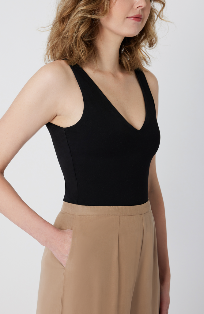 The Tall Wide Leg Pant features deep, inseam pockets that comfortably fit your whole hand, a smartphone or a small wallet. It’s shown here in a desert beige color.