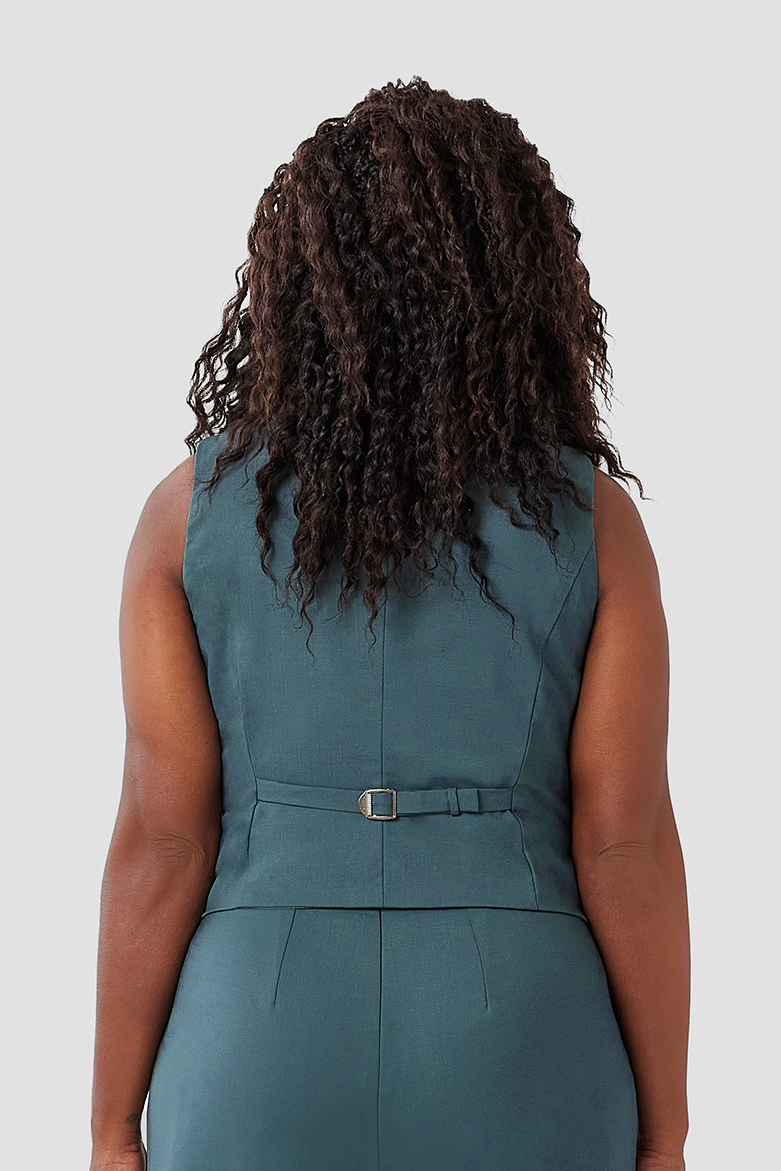 The Wool Vest by Aam features an adjustable back strap to cinch the waist for a "just right" fit.