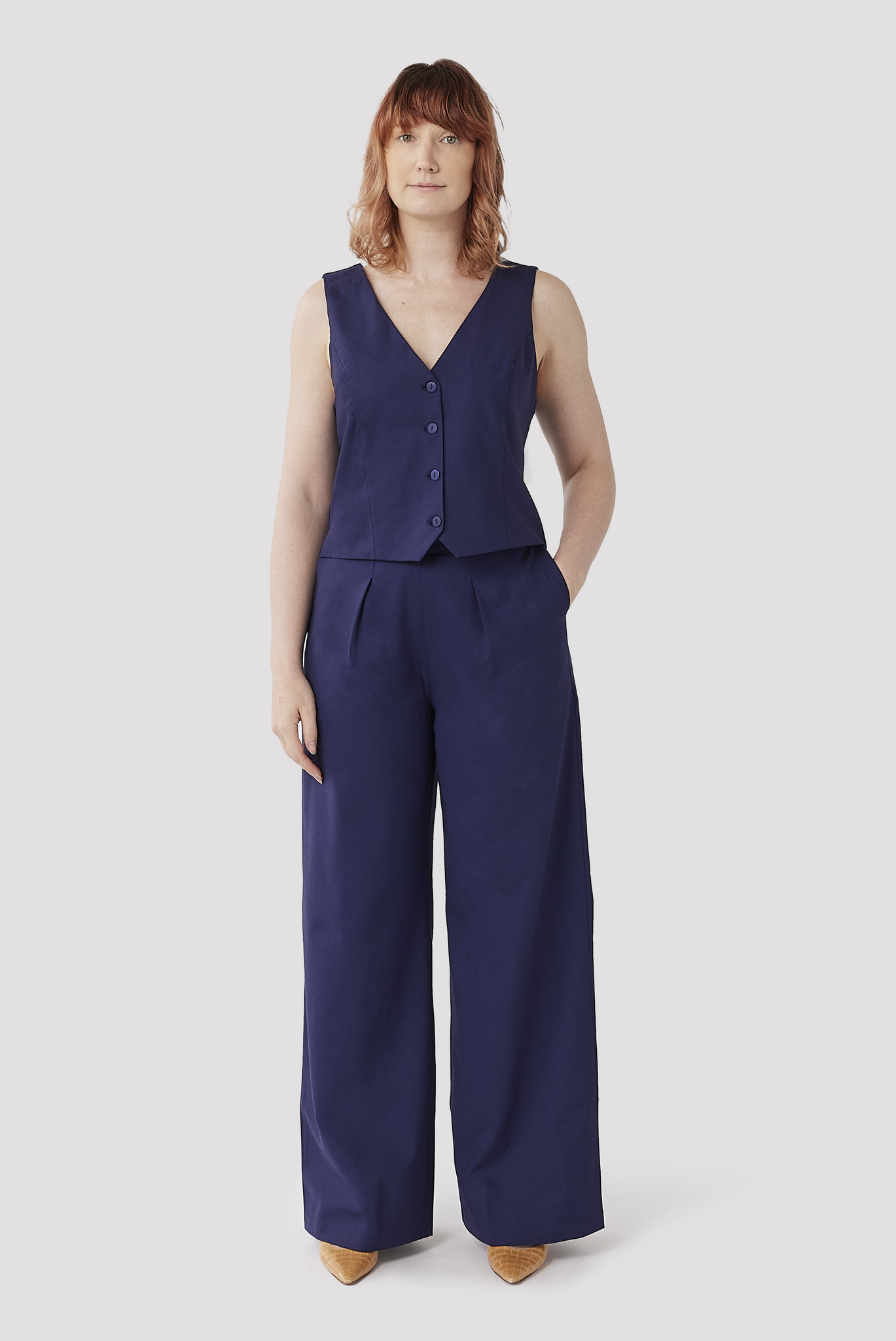 The Wool Vest is designed to pair perfectly with The Wool Wide Leg Pant by Aam. The two form a matching co-ord set, which is depicted here.
