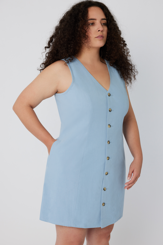 The Everywhere Dress has deep, functional pockets that comfortably fit your whole hand, most smartphones or a small wallet. Here it shown in sky blue.