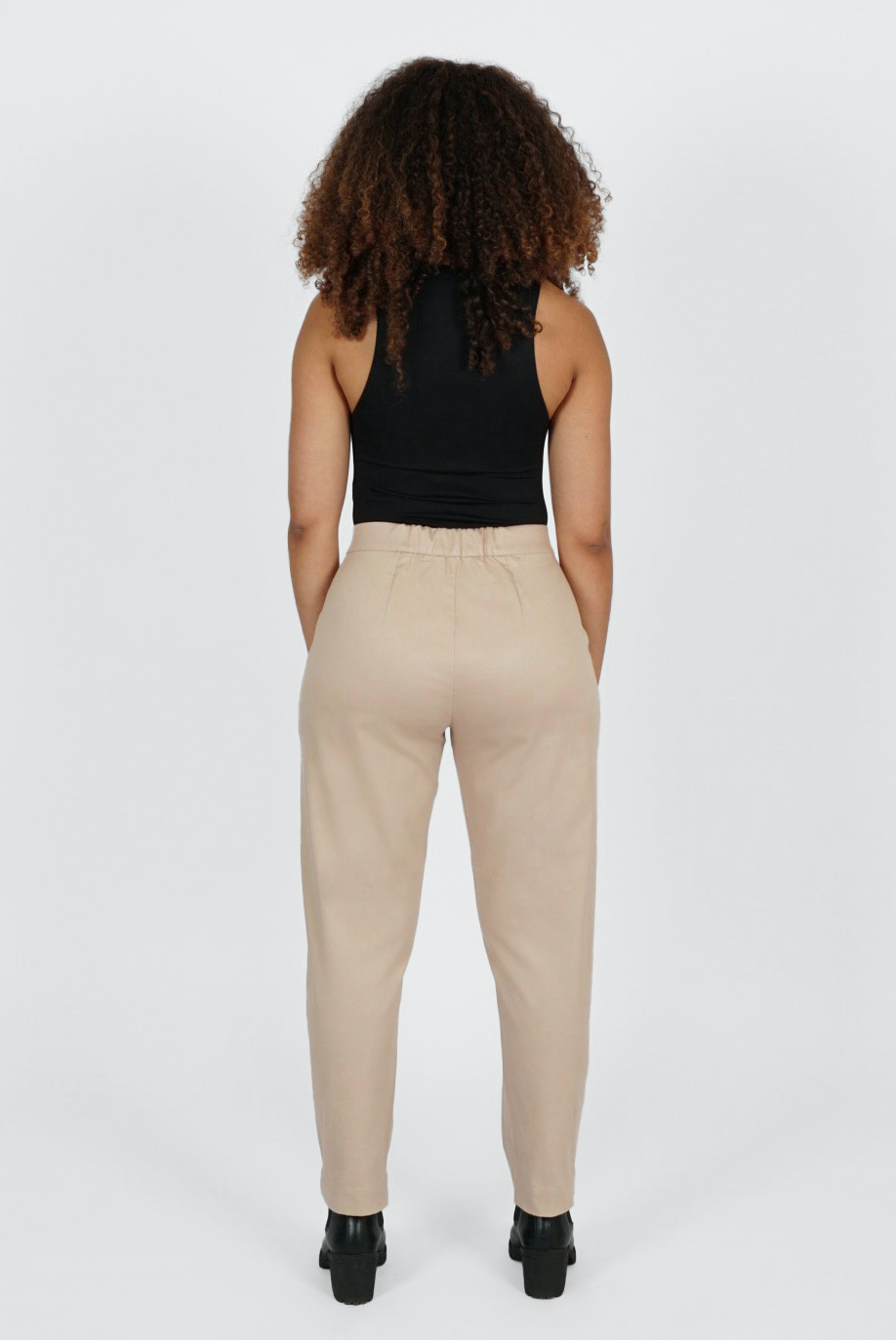 The Crop Pant by Aam The Label is designed to sit snug at the waist with a small back elastic that provides 2-3" of stretch. It has a roomy fit through the hips and thighs for pear and hourglass shaped bodies.